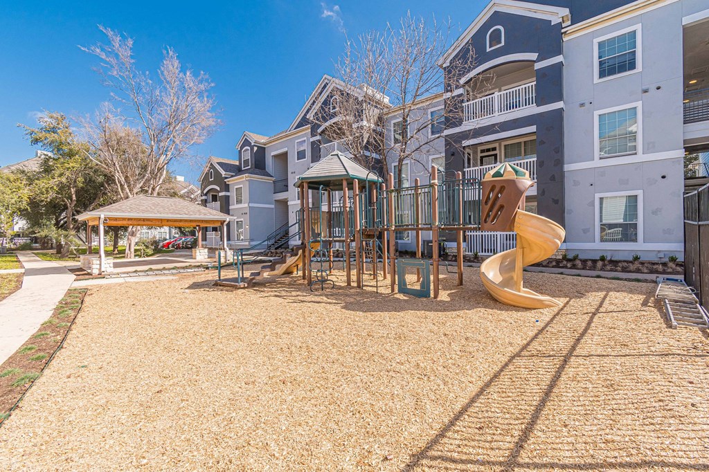 playground with swing set and gazebo playground with swing set and gazebo at Capitol Crossing, Austin, 78744